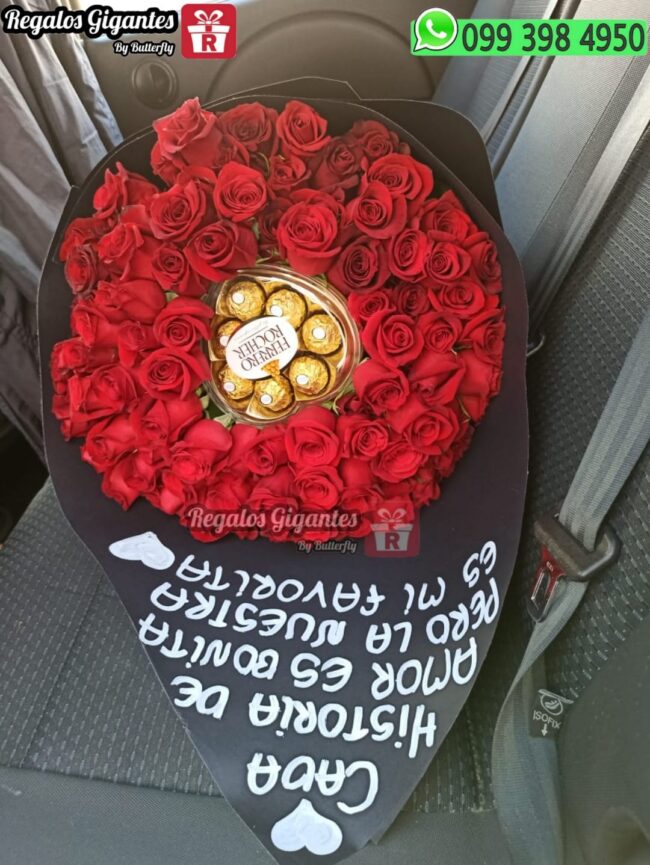 Bouquet de 100 rosas y ferrero corazon